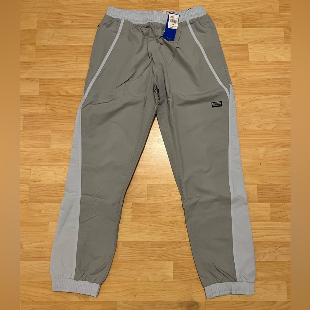 ADIDAS R.Y.V. V-LINE WOVEN TRACK PANTS